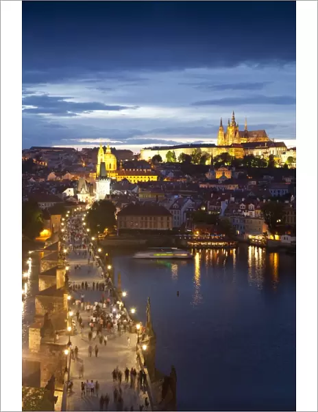St. Vitus Cathedral, Charles Bridge, River Vltava and the Castle District illuminated at night, UNESCO World Heritage Site, Prague, Czech Republic, Europe
