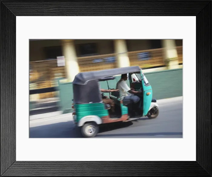 Framed Print : Tuk tuk driving along street, Negombo, Western Province, Sri Lanka, Asia Framed Print : Tuk tuk driving along street, Negombo, Western Province, Sri Lanka, Asia