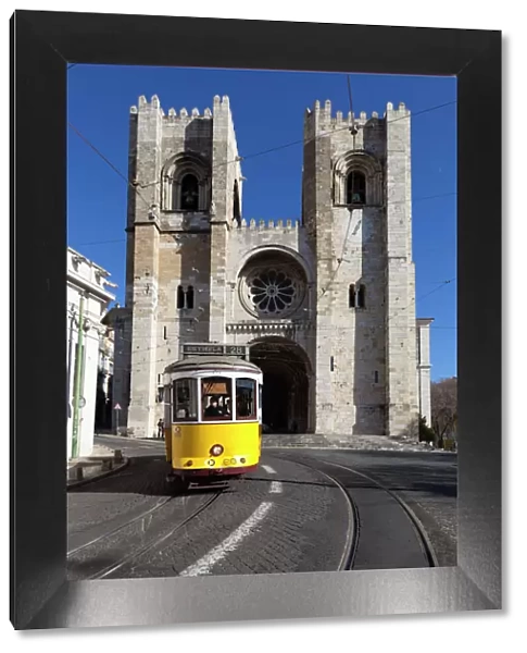 Se Cathedral and tram (electricos), Alfama, Lisbon, Portugal, Europe