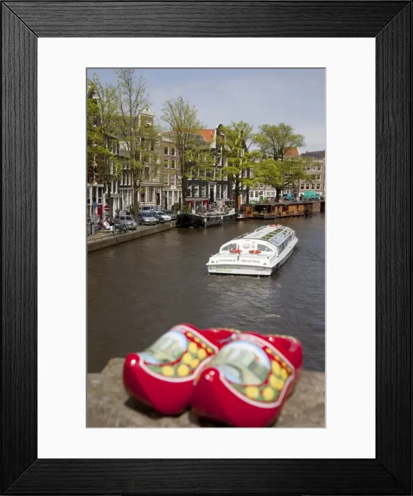 Framed Print : Souvenir clogs and canal, Amsterdam, Holland, Europe Framed Print : Souvenir clogs and canal, Amsterdam, Holland, Europe