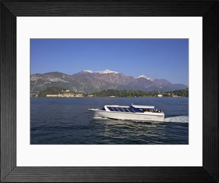 Framed Print : Pleasure boat crossing Lake Como from Bellagio in spring sunshine, Lombardy, Italian Lakes, Italy, Europe Framed Print : Pleasure boat crossing Lake Como from Bellagio in spring sunshine, Lombardy, Italian Lakes, Italy, Europe