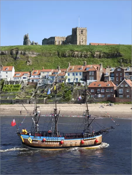 Pleasure ship below Whitby Abbey and St. Marys Church, Whitby, North Yorkshire, Yorkshire, England, United Kingdom, Europe