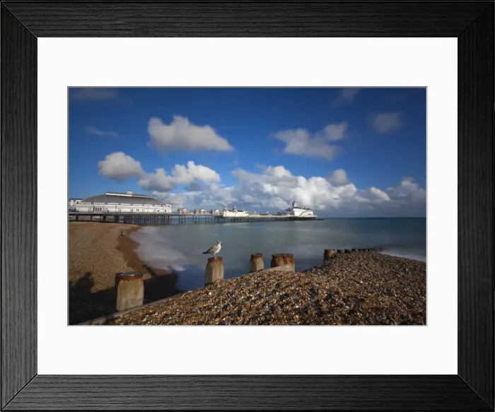 Framed Print : Pebble beach and pier, Eastbourne, East Sussex, England Framed Print : Pebble beach and pier, Eastbourne, East Sussex, England