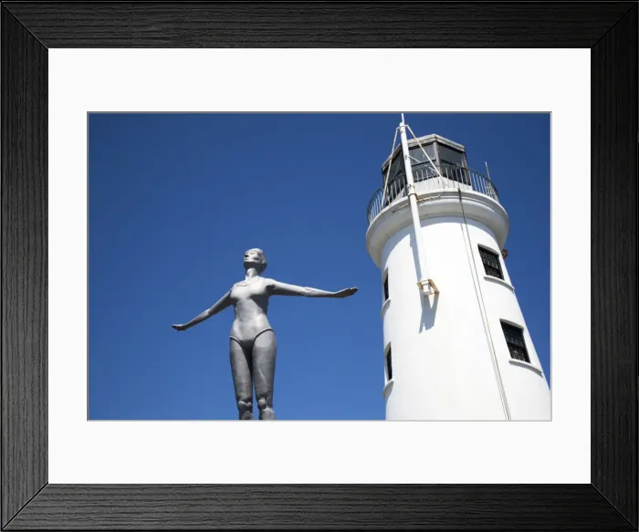 Framed Print : The Diving Belle Sculpture and Lighthouse on Vincents Pier, Scarborough, North Yorkshire, Yorkshire, England, United Kingdom, Europe Framed Print : The Diving Belle Sculpture and Lighthouse on Vincents Pier, Scarborough, North Yorkshire, Yorkshire, England, United Kingdom, Europe