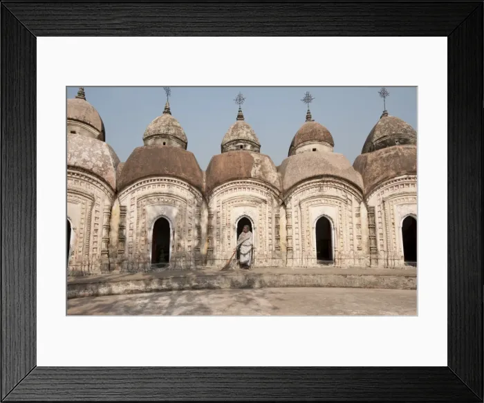 Framed Print : Woman with broom emerging from one of 108 Shiva temples built by Maharaja Teja Chandra Bahadur in 1809, Kalna, West Bengal, India, Asia