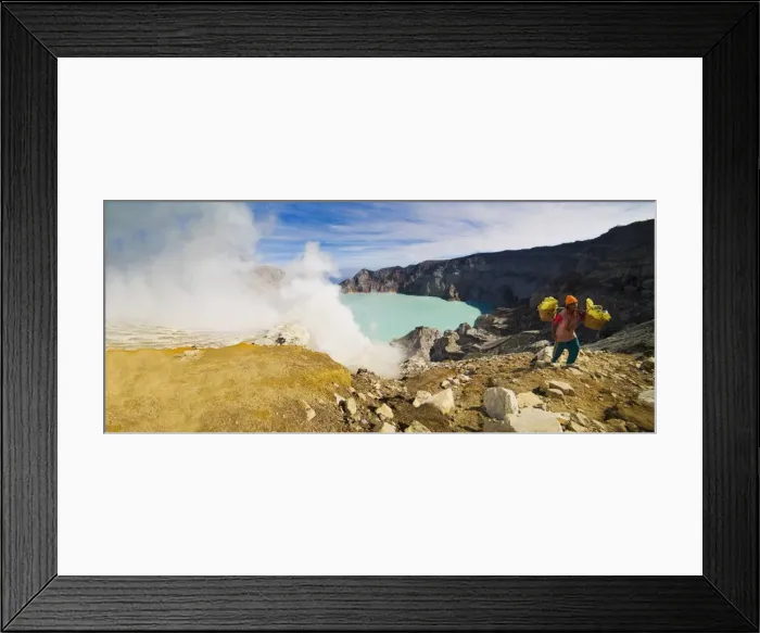 Framed Print : Panorama of sulphur worker appearing out of toxic fumes at Kawah Ijen volcano, East Java, Indonesia, Southeast Asia, Asia Framed Print : Panorama of sulphur worker appearing out of toxic fumes at Kawah Ijen volcano, East Java, Indonesia, Southeast Asia, Asia