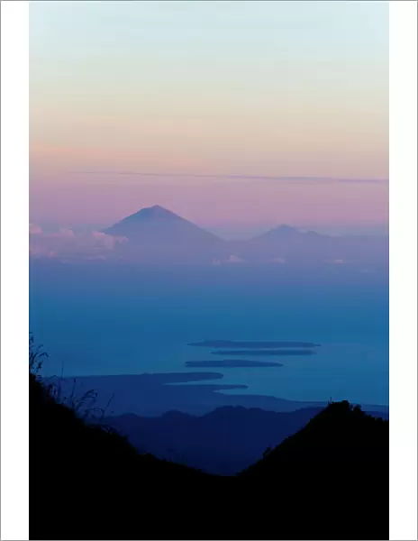 Sunset over Mount Agung and Mount Batur on Bali, and the Three Gili Isles taken from Mount Rinjani, Lombok, Indonesia, Southeast Asia, Asia