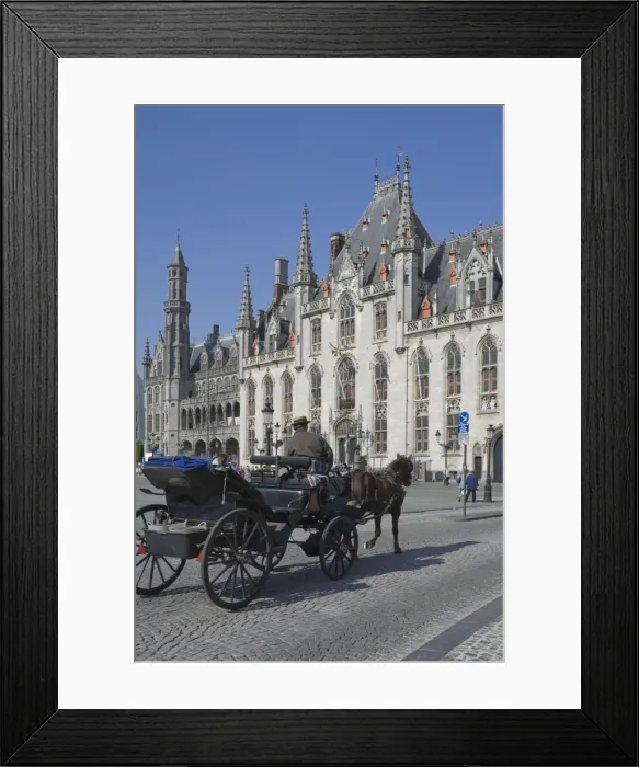 Framed Print : A horse drawn carraige drives past the Provincial Court Building in the Market Square, Brugge, UNESCO World Heritage Site, Belgium, Europe Framed Print : A horse drawn carraige drives past the Provincial Court Building in the Market Square, Brugge, UNESCO World Heritage Site, Belgium, Europe
