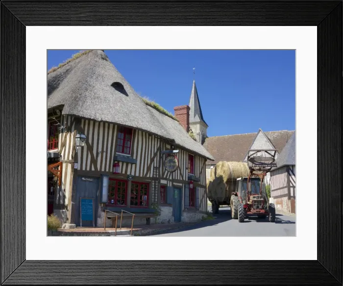 Framed Print : Auberge des Deux Tonneaux (Two Barrels Inn), typical ancient Norman cottage, thatched and half timbered, with tractor, Pierrefitte en Auge, Calvados, Normandy, France, Europe