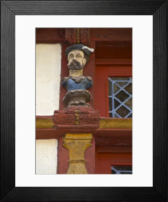 Framed Print : Detail of wood sculptures on the Keratry Mansion house dating from the 16th century, Old Town, Dinan, Brittany, Cotes d Armor, France, Europe Framed Print : Detail of wood sculptures on the Keratry Mansion house dating from the 16th century, Old Town, Dinan, Brittany, Cotes d Armor, France, Europe