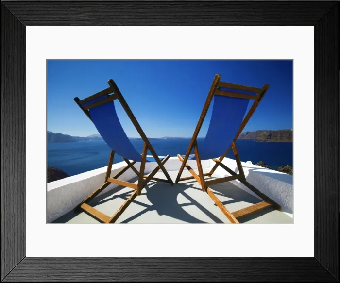 Framed Print : Deck chairs on terrace overlooking ocean, Santorini, Cyclades, Greek Islands, Greece, Europe Framed Print : Deck chairs on terrace overlooking ocean, Santorini, Cyclades, Greek Islands, Greece, Europe