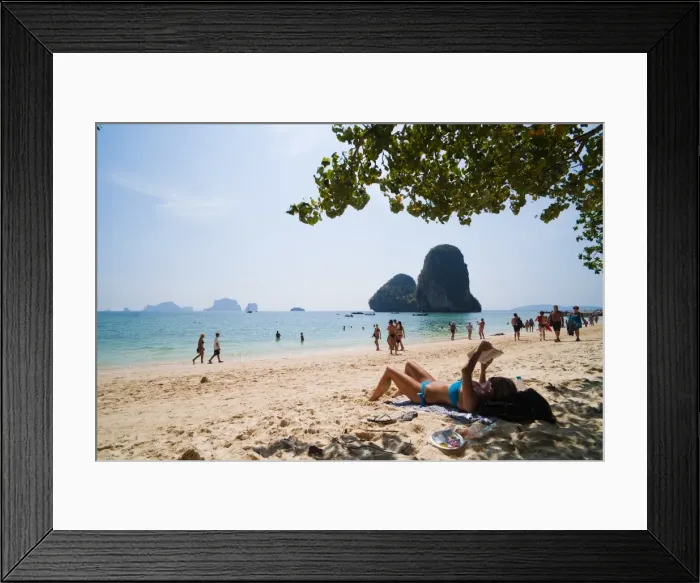 Framed Print : Tourist sunbathing and reading on Ao Phra Nang Beach, Railay (Rai Leh), South Thailand, Southeast Asia, Asia Framed Print : Tourist sunbathing and reading on Ao Phra Nang Beach, Railay (Rai Leh), South Thailand, Southeast Asia, Asia