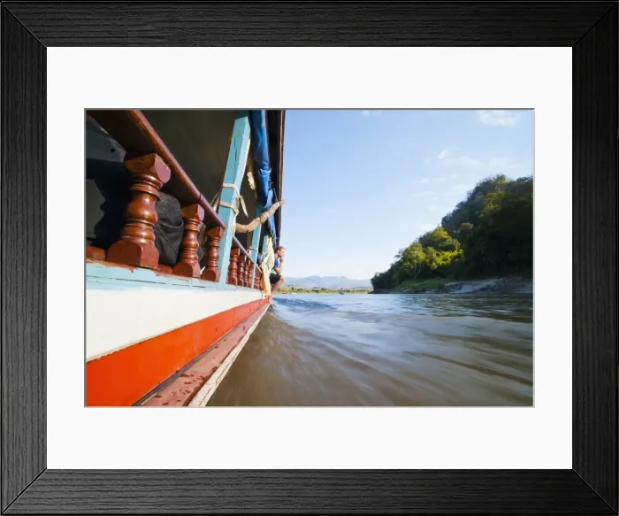 Framed Print : Tourist on the side of the slow boat from Thailand to Vientiane, Laos, Indochina, Southeast Asia, Asia Framed Print : Tourist on the side of the slow boat from Thailand to Vientiane, Laos, Indochina, Southeast Asia, Asia
