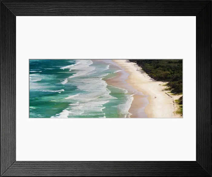 Framed Print : Panoramic photo of surfers heading out to surf on Tallow Beach at Cape Byron Bay, New South Wales, Australia, Pacific Framed Print : Panoramic photo of surfers heading out to surf on Tallow Beach at Cape Byron Bay, New South Wales, Australia, Pacific