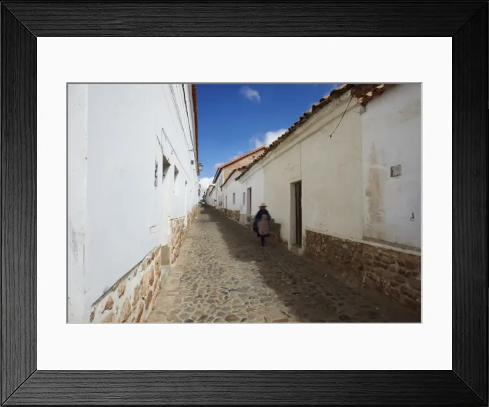 Framed Print : Woman walking along alleyway, Sucre, UNESCO World Heritage Site, Bolivia, South America Framed Print : Woman walking along alleyway, Sucre, UNESCO World Heritage Site, Bolivia, South America