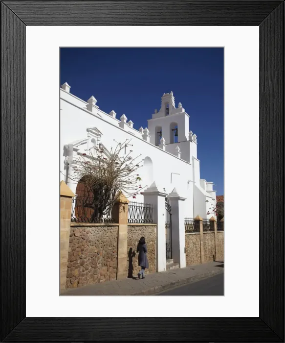 Framed Print : Woman walking past Iglesia de Santo Domingo, Sucre, UNESCO World Heritage Site, Bolivia, South America Framed Print : Woman walking past Iglesia de Santo Domingo, Sucre, UNESCO World Heritage Site, Bolivia, South America