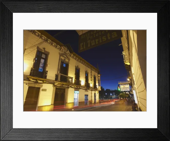 Framed Print : Traffic passing along street at dusk, Sucre, UNESCO World Heritage Site, Bolivia, South America Framed Print : Traffic passing along street at dusk, Sucre, UNESCO World Heritage Site, Bolivia, South America