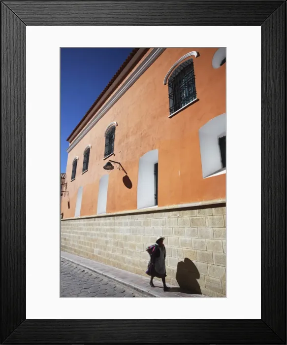Framed Print : Woman walking along street, Potosi, UNESCO World Heritage Site, Bolivia, South America