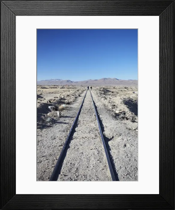 Framed Print : People walking along train tracks, Uyuni, Potosi Department, Bolivia, South America Framed Print : People walking along train tracks, Uyuni, Potosi Department, Bolivia, South America