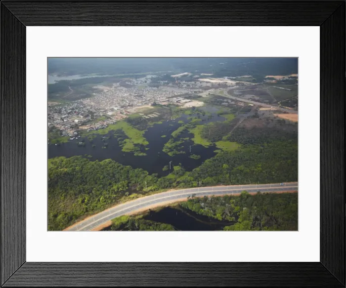 Framed Print : Aerial view of development encroaching on the Amazon rainforest and Rio Negro, Manaus, Amazonas, Brazil, South America Framed Print : Aerial view of development encroaching on the Amazon rainforest and Rio Negro, Manaus, Amazonas, Brazil, South America