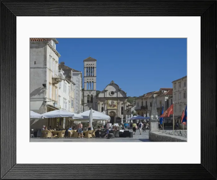 Framed Print : Cafes in the main square with St. Stephens Cathedral in the medieval city of Hvar, Island of Hvar, Dalmatia, Croatia, Europe Framed Print : Cafes in the main square with St. Stephens Cathedral in the medieval city of Hvar, Island of Hvar, Dalmatia, Croatia, Europe