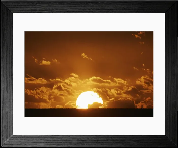 Framed Print : Sun setting over the sea with light clouds, Fiji, South Pacific, Pacific Framed Print : Sun setting over the sea with light clouds, Fiji, South Pacific, Pacific