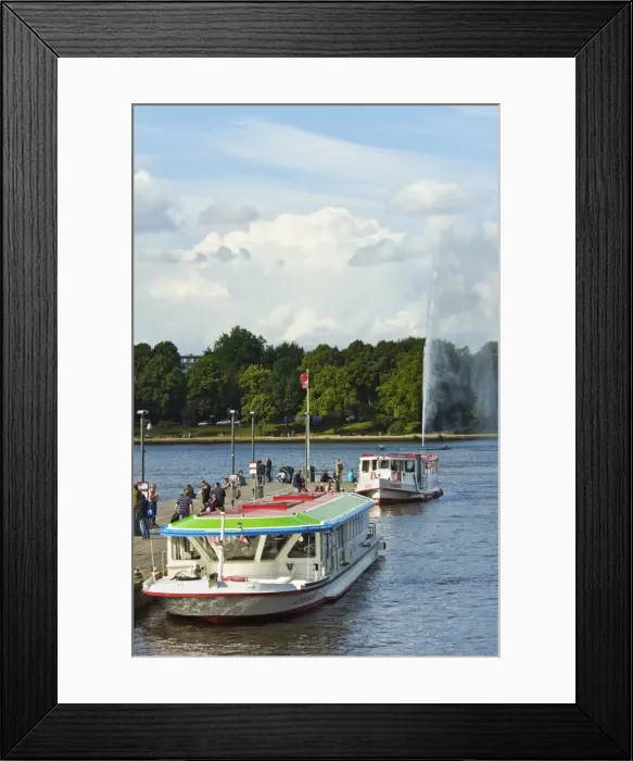 Framed Print : Tour boats that ply Alster Lake moored at the Jungfernstieg with the Lombardsbruecke beyond, Hamburg, Germany, Europe Framed Print : Tour boats that ply Alster Lake moored at the Jungfernstieg with the Lombardsbruecke beyond, Hamburg, Germany, Europe