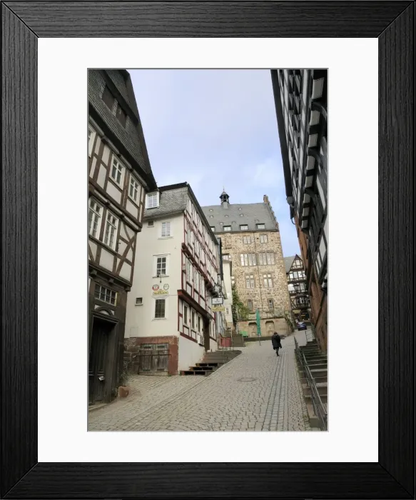 Framed Print : Steep narrow street in medieval city of Marburg, Hesse, Germany, Europe Framed Print : Steep narrow street in medieval city of Marburg, Hesse, Germany, Europe