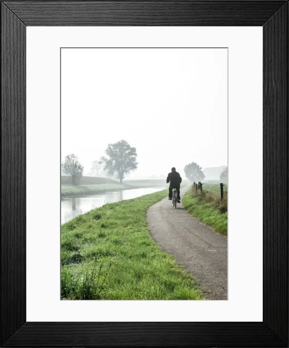 Framed Print : Man cycling on countryside cycle path next to the River Mark in autumn, Breda, North Brabant, The Netherlands (Holland), Europe Framed Print : Man cycling on countryside cycle path next to the River Mark in autumn, Breda, North Brabant, The Netherlands (Holland), Europe