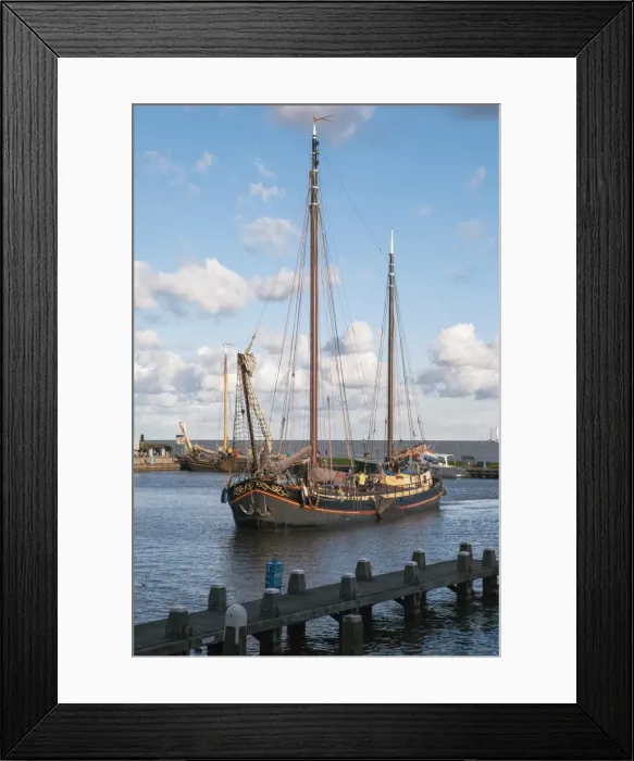 Framed Print : Traditional Dutch merchant ship sailing into Volendam harbour, North Holland Province, The Netherlands (Holland), Europe Framed Print : Traditional Dutch merchant ship sailing into Volendam harbour, North Holland Province, The Netherlands (Holland), Europe
