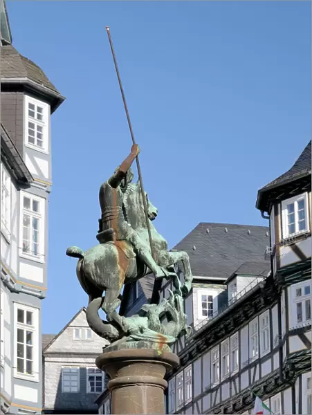 Statue of St. George slaying the dragon, Market Square, Marburg, Hesse, Germany, Europe