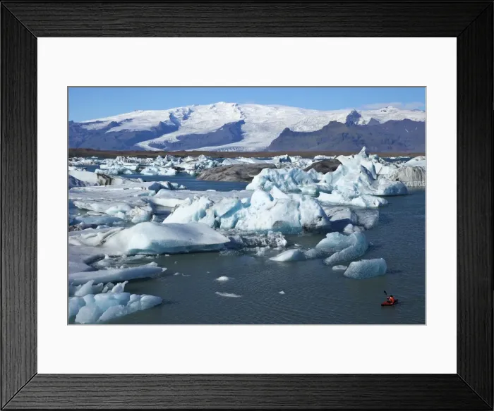 Framed Print : Canoeist paddles between icebergs on glacial lake at Jokulsarlon with snow on the massive icecap of Vatnajokull behind, Iceland, Polar Regions Framed Print : Canoeist paddles between icebergs on glacial lake at Jokulsarlon with snow on the massive icecap of Vatnajokull behind, Iceland, Polar Regions