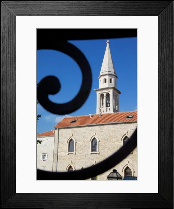 Framed Print : Church belltower viewed through wrought iron railings of the Old Town, Bidva, Montenegro, Europe Framed Print : Church belltower viewed through wrought iron railings of the Old Town, Bidva, Montenegro, Europe