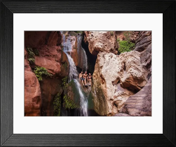 Framed Print : Tourists bathing in a waterfall, seen while rafting down the Colorado River, Grand Canyon, Arizona, United States of America, North America Framed Print : Tourists bathing in a waterfall, seen while rafting down the Colorado River, Grand Canyon, Arizona, United States of America, North America
