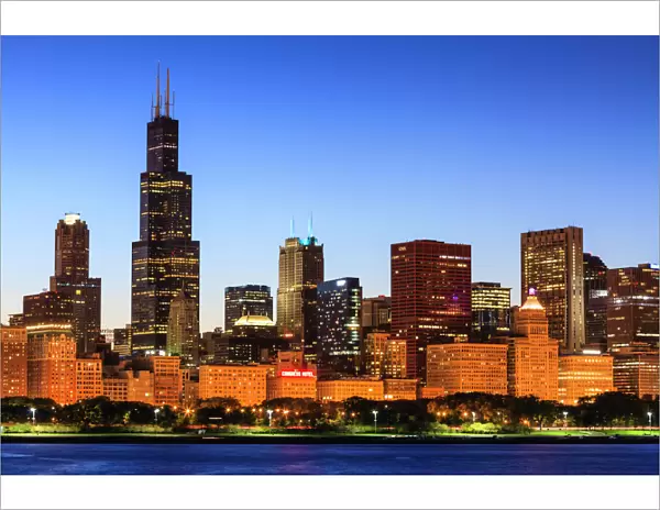 Chicago skyline and Lake Michigan at dusk with the Willis Tower, formerly the Sears Tower, on the left, Chicago, Illinois, United States of America, North America