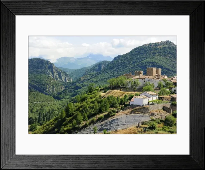 Framed Print : Binies village and castle with Foz de Binies gorge, Anso valley and Pyreneean peaks in the background, Huesca, Aragon, Spain, Europe Framed Print : Binies village and castle with Foz de Binies gorge, Anso valley and Pyreneean peaks in the background, Huesca, Aragon, Spain, Europe