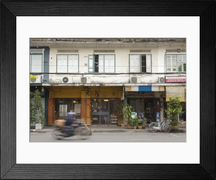 Framed Print : A motorbike rides past a shop front in Rattanakosin, Bangkok, Thailand, Southeast Asia, Asia Framed Print : A motorbike rides past a shop front in Rattanakosin, Bangkok, Thailand, Southeast Asia, Asia