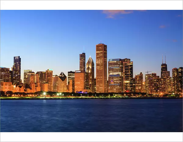 Chicago skyline and Lake Michigan at dusk, Chicago, Illinois, United States of America, North America