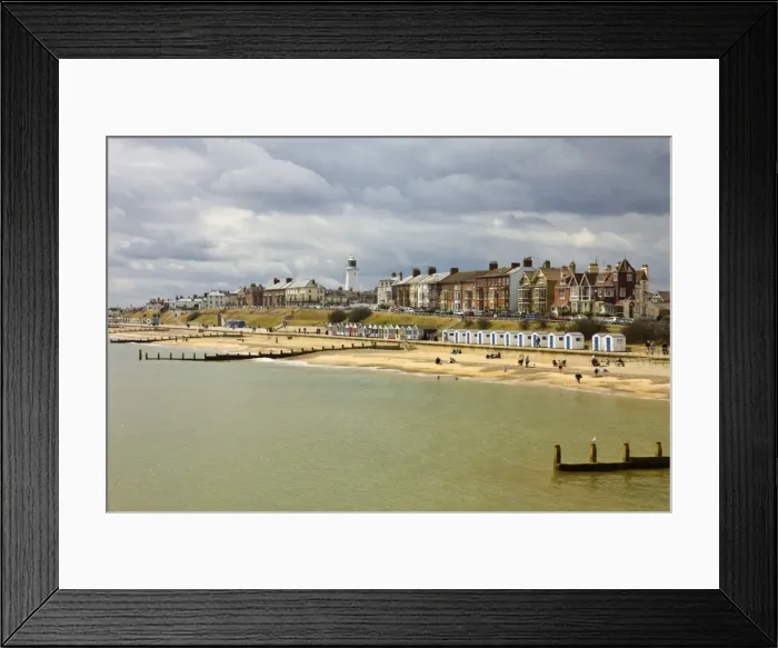 Framed Print : Seafront of this attractive town with the lighthouse, North Parade and the famously pricey beach huts, Southwold, Suffolk, England, United Kingdom, Europe Framed Print : Seafront of this attractive town with the lighthouse, North Parade and the famously pricey beach huts, Southwold, Suffolk, England, United Kingdom, Europe