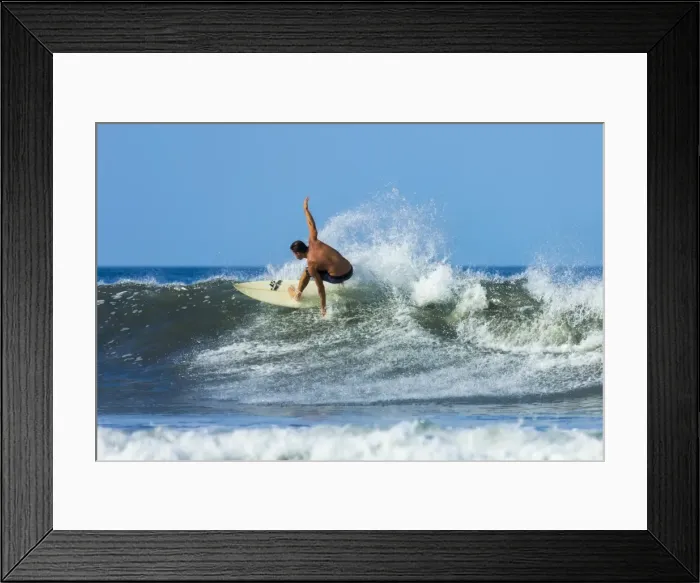 Framed Print : Surfer on shortboard riding wave at popular Playa Guiones surf beach, Nosara, Nicoya Peninsula, Guanacaste Province, Costa Rica, Central America Framed Print : Surfer on shortboard riding wave at popular Playa Guiones surf beach, Nosara, Nicoya Peninsula, Guanacaste Province, Costa Rica, Central America