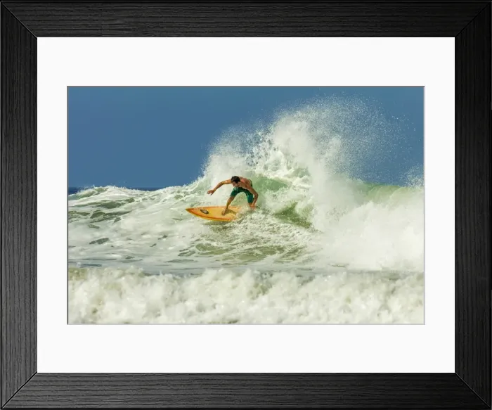 Framed Print : Surfer on shortboard riding wave at popular Playa Guiones surf beach, Nosara, Nicoya Peninsula, Guanacaste Province, Costa Rica, Central America Framed Print : Surfer on shortboard riding wave at popular Playa Guiones surf beach, Nosara, Nicoya Peninsula, Guanacaste Province, Costa Rica, Central America