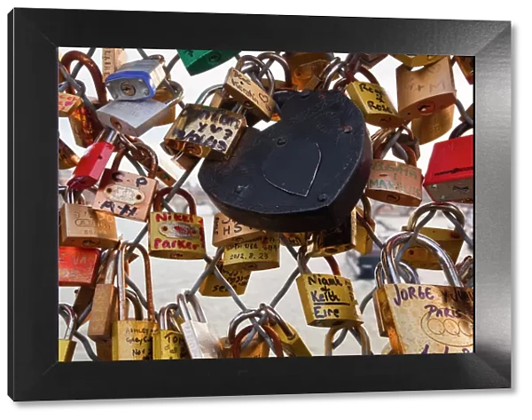 Love locks on the Pont des Arts in Paris, France, Europe