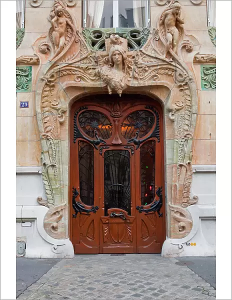 An art nouveau doorway in central Paris, France, Europe