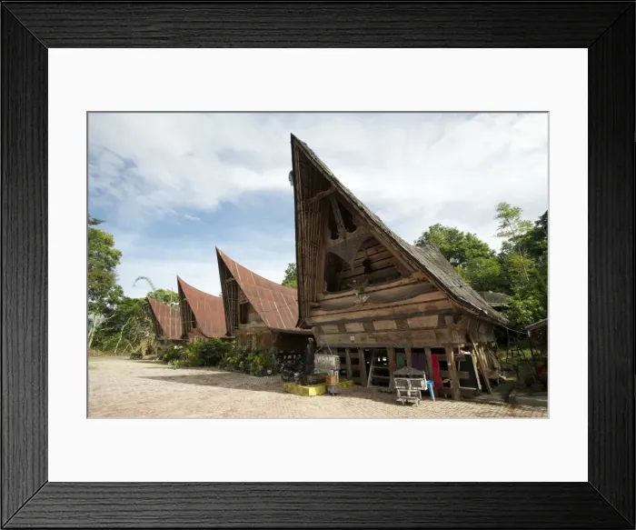 Framed Print : Batak Toba village houses with high ended roof and tribal carvings, Tomuk, Samosir Island, Sumatra, Indonesia, Southeast Asia, Asia Framed Print : Batak Toba village houses with high ended roof and tribal carvings, Tomuk, Samosir Island, Sumatra, Indonesia, Southeast Asia, Asia