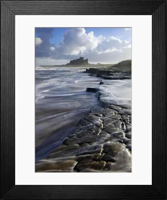 Framed Print : Surf on rocks, Bamburgh Castle, Northumberland, England, United Kingdom, Europe Framed Print : Surf on rocks, Bamburgh Castle, Northumberland, England, United Kingdom, Europe