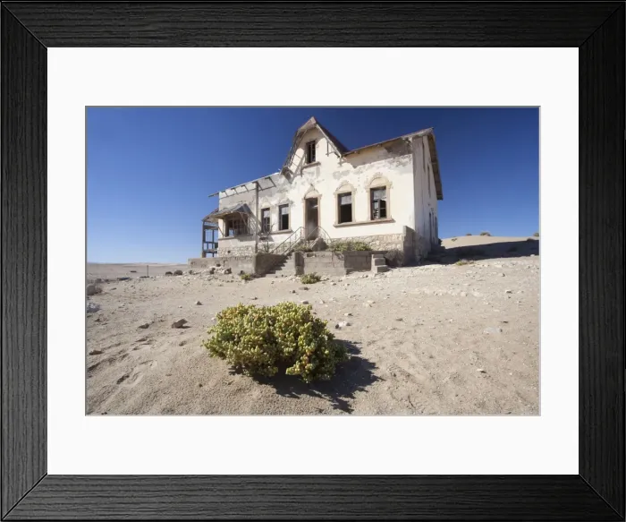 Framed Print : House slowly being reclaimed by the desert in the abandoned former German diamond mining town of Kolmanskop on the edge of the Namib Desert, Forbidden Diamond Area near Luderitz, Namibia, Africa Framed Print : House slowly being reclaimed by the desert in the abandoned former German diamond mining town of Kolmanskop on the edge of the Namib Desert, Forbidden Diamond Area near Luderitz, Namibia, Africa