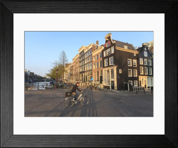 Framed Print : Cyclist crossing a bridge over Keizersgracht Canal, Amsterdam, Netherlands, Europe