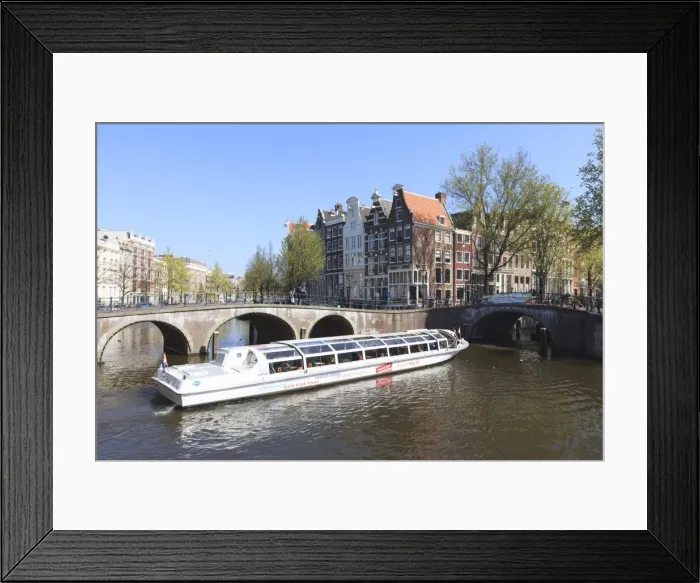 Framed Print : Tourist boat crossing Keizersgracht Canal, Amsterdam, Netherlands, Europe Framed Print : Tourist boat crossing Keizersgracht Canal, Amsterdam, Netherlands, Europe
