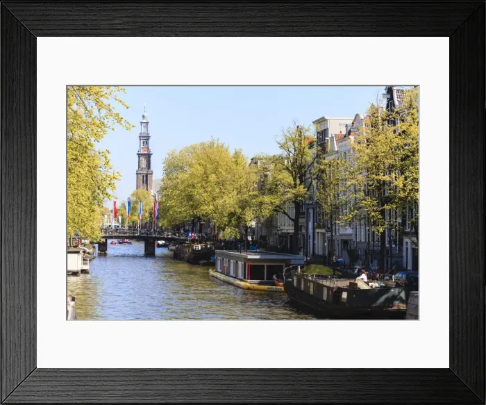 Framed Print : Westerkerk church tower by Prinsengracht canal, Amsterdam, Netherlands, Europe Framed Print : Westerkerk church tower by Prinsengracht canal, Amsterdam, Netherlands, Europe