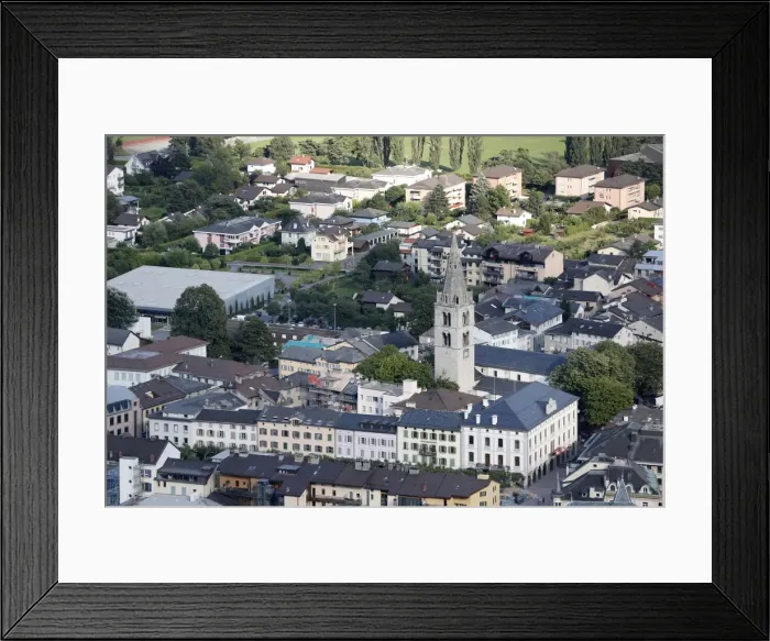 Framed Print : Church in the city of Martigny, Valais, Switzerland, Europe Framed Print : Church in the city of Martigny, Valais, Switzerland, Europe